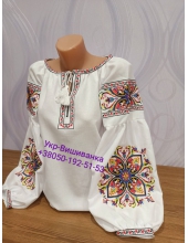 Жіноча вишиванка р. 54 .