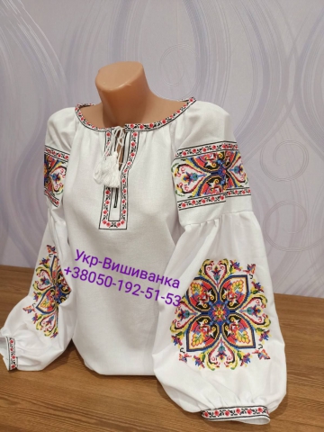 Жіноча вишиванка р. 54 .